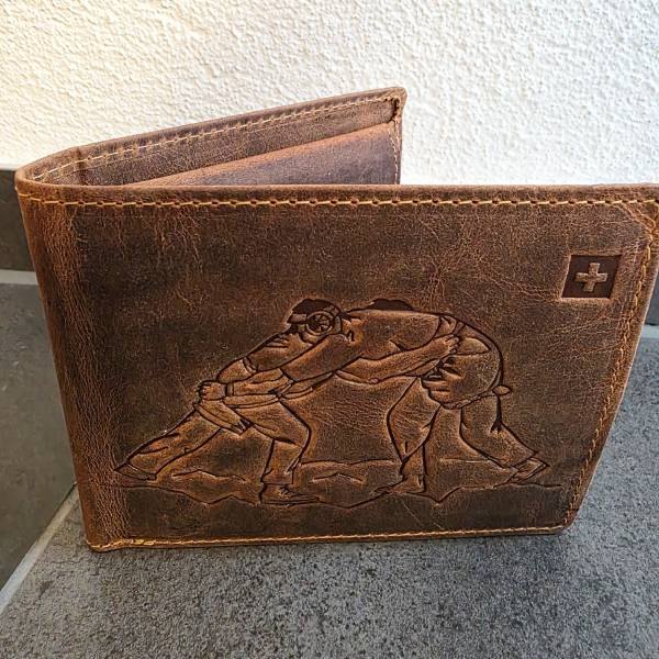 Leder-Portemonnaie mit eingeprägtem Schwinger-Motiv und Schweizerkreuz
